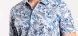 Light blue polo shirt with a bold pattern